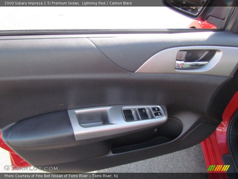 Lightning Red / Carbon Black 2009 Subaru Impreza 2.5i Premium Sedan