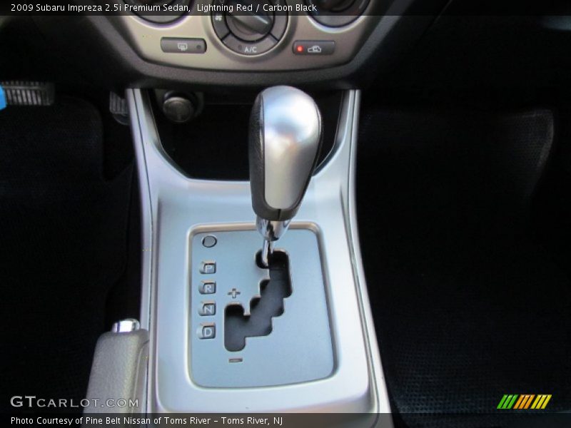 Lightning Red / Carbon Black 2009 Subaru Impreza 2.5i Premium Sedan