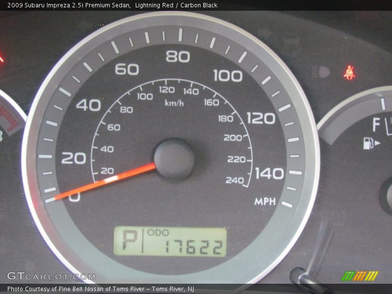 Lightning Red / Carbon Black 2009 Subaru Impreza 2.5i Premium Sedan