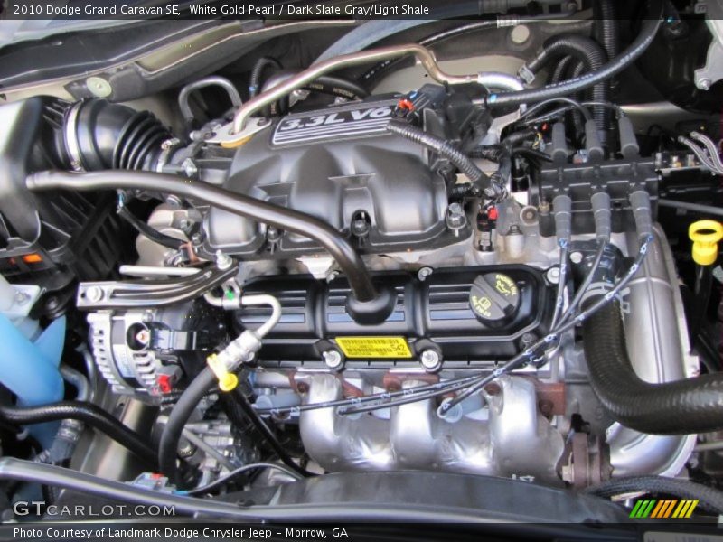 White Gold Pearl / Dark Slate Gray/Light Shale 2010 Dodge Grand Caravan SE