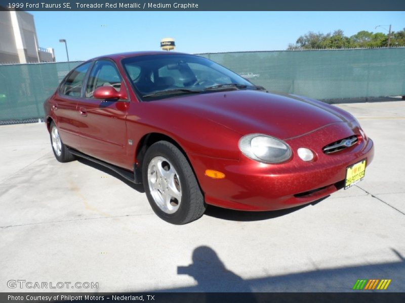 Toreador Red Metallic / Medium Graphite 1999 Ford Taurus SE