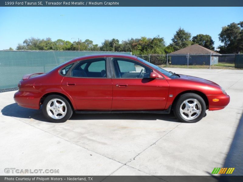  1999 Taurus SE Toreador Red Metallic
