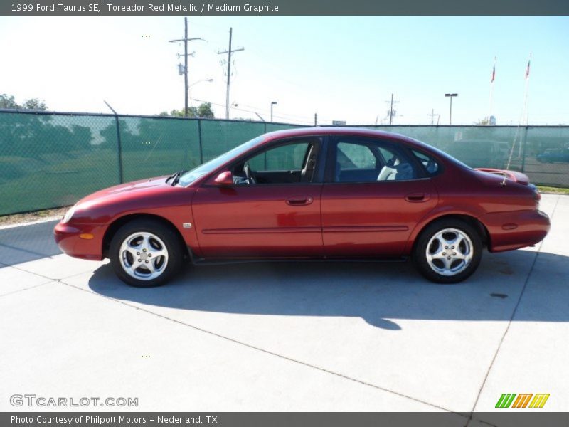 Toreador Red Metallic / Medium Graphite 1999 Ford Taurus SE