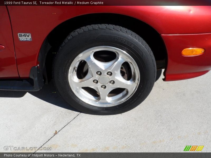 Toreador Red Metallic / Medium Graphite 1999 Ford Taurus SE