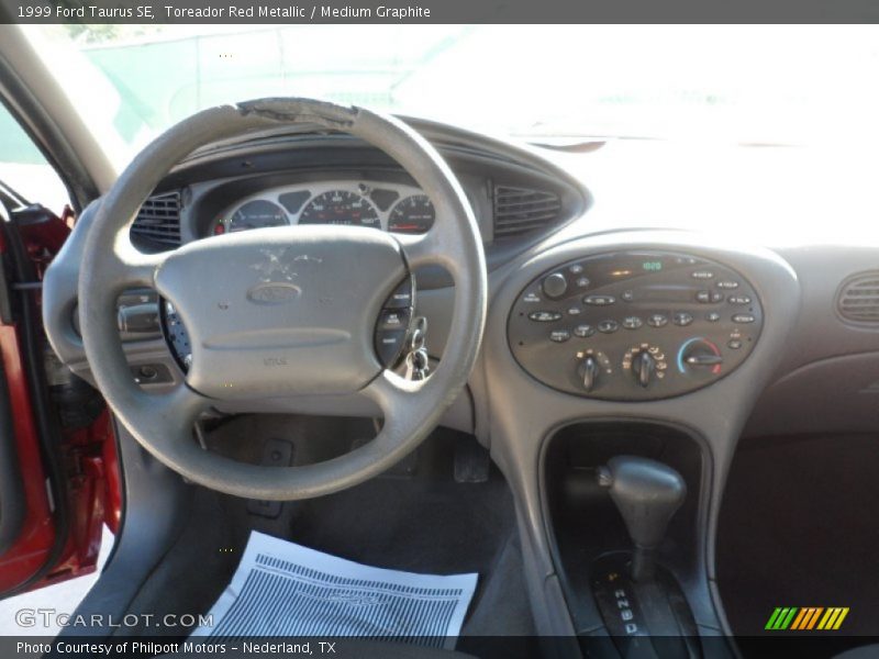 Toreador Red Metallic / Medium Graphite 1999 Ford Taurus SE
