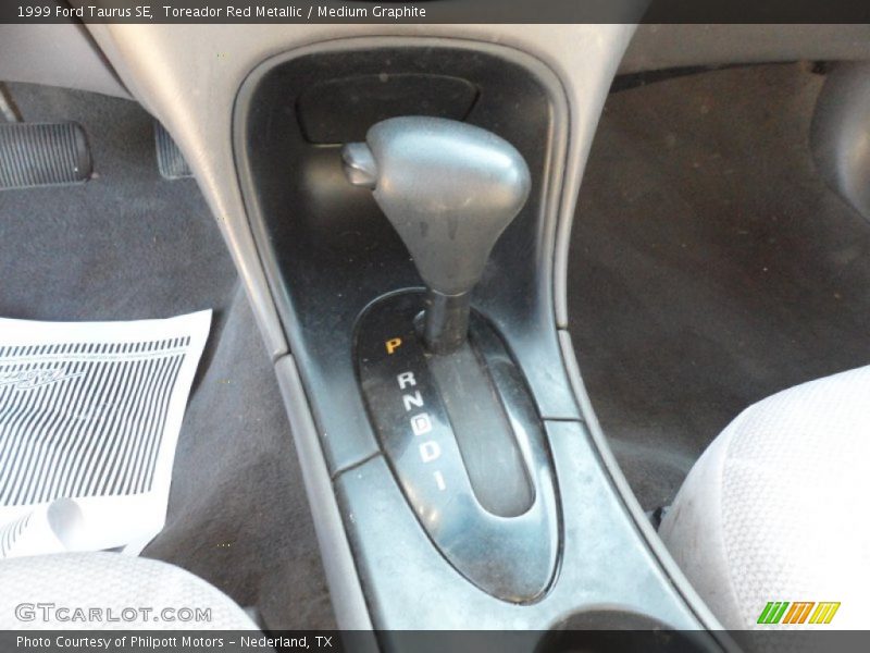 Toreador Red Metallic / Medium Graphite 1999 Ford Taurus SE