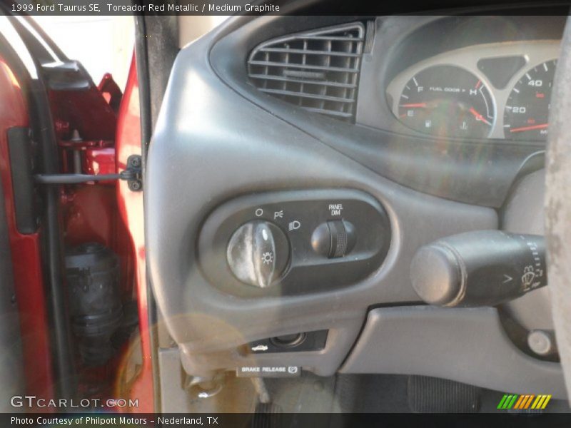 Toreador Red Metallic / Medium Graphite 1999 Ford Taurus SE