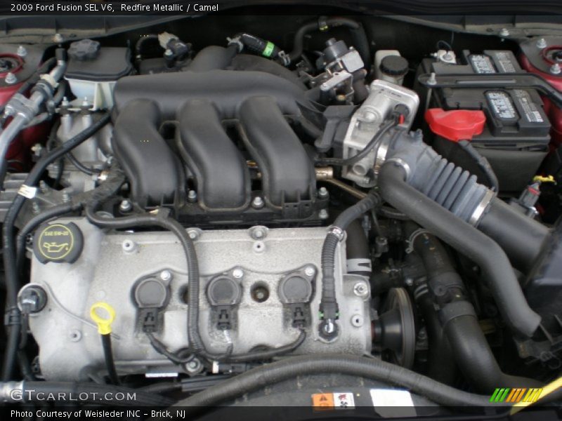 Redfire Metallic / Camel 2009 Ford Fusion SEL V6