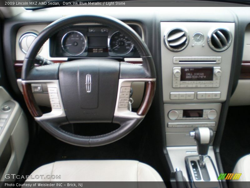 Dark Ink Blue Metallic / Light Stone 2009 Lincoln MKZ AWD Sedan