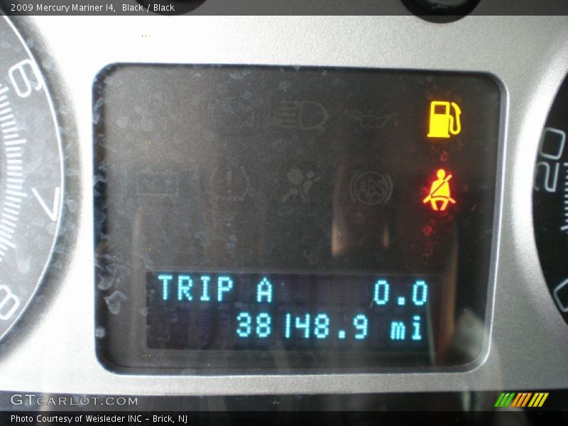 Black / Black 2009 Mercury Mariner I4