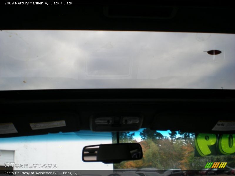 Black / Black 2009 Mercury Mariner I4