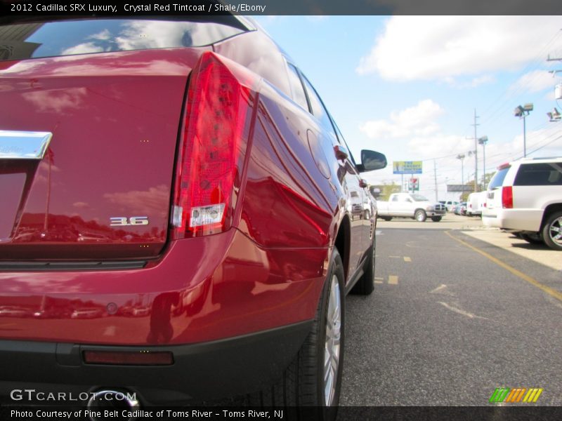 Crystal Red Tintcoat / Shale/Ebony 2012 Cadillac SRX Luxury