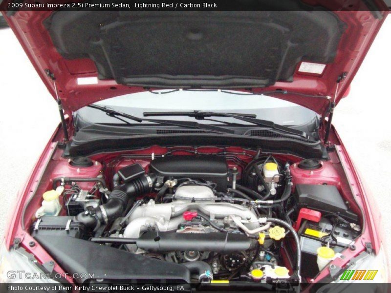 Lightning Red / Carbon Black 2009 Subaru Impreza 2.5i Premium Sedan