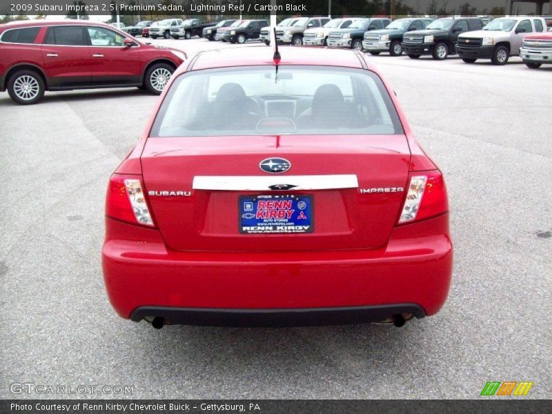 Lightning Red / Carbon Black 2009 Subaru Impreza 2.5i Premium Sedan