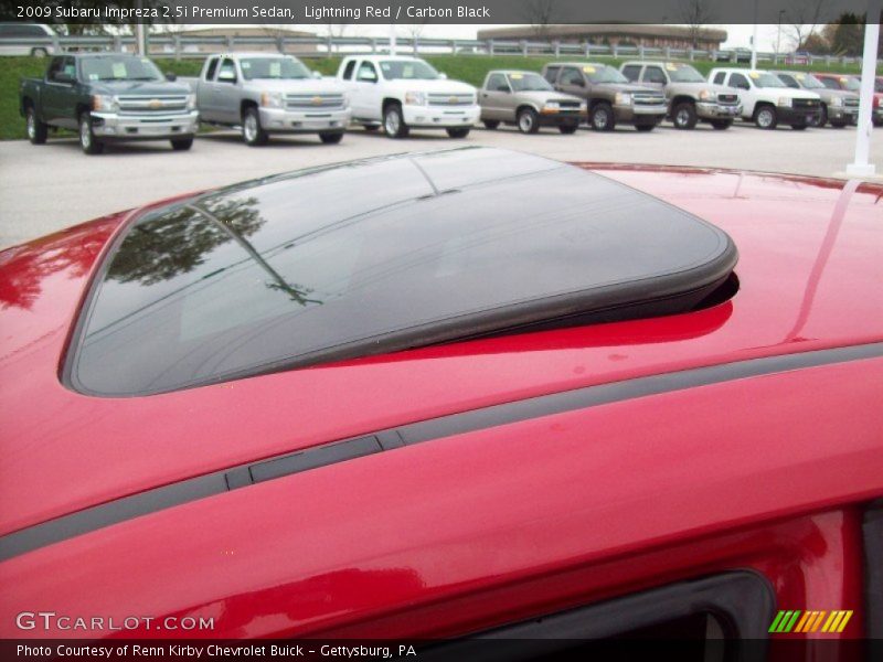 Lightning Red / Carbon Black 2009 Subaru Impreza 2.5i Premium Sedan