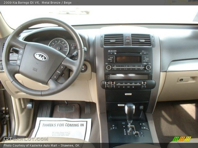 Metal Bronze / Beige 2009 Kia Borrego EX V6