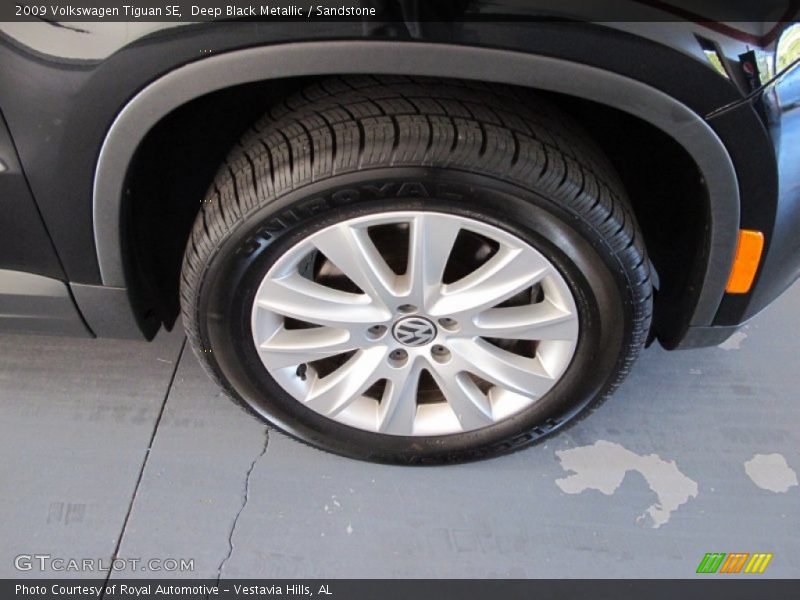 Deep Black Metallic / Sandstone 2009 Volkswagen Tiguan SE