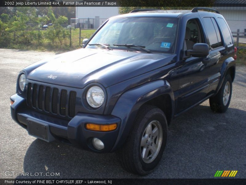 Patriot Blue Pearlcoat / Taupe 2002 Jeep Liberty Limited 4x4