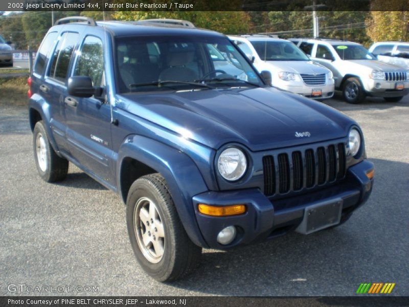 Patriot Blue Pearlcoat / Taupe 2002 Jeep Liberty Limited 4x4