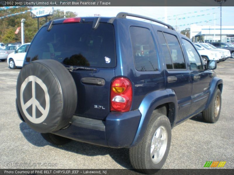 Patriot Blue Pearlcoat / Taupe 2002 Jeep Liberty Limited 4x4