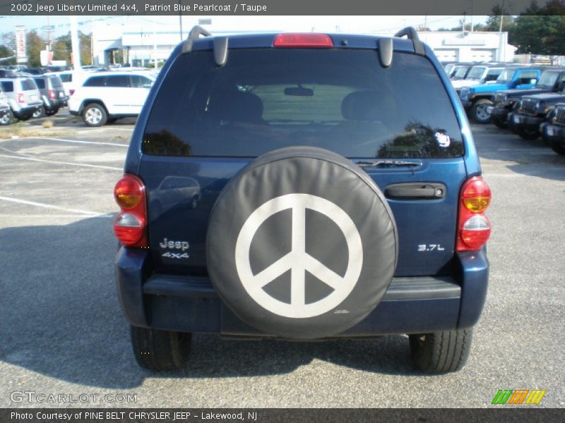 Patriot Blue Pearlcoat / Taupe 2002 Jeep Liberty Limited 4x4