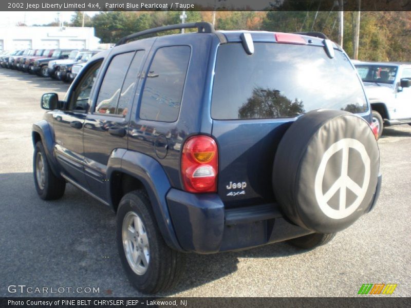 Patriot Blue Pearlcoat / Taupe 2002 Jeep Liberty Limited 4x4