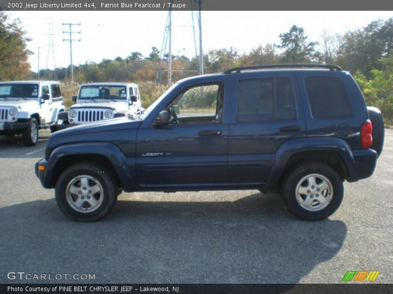 Patriot Blue Pearlcoat / Taupe 2002 Jeep Liberty Limited 4x4