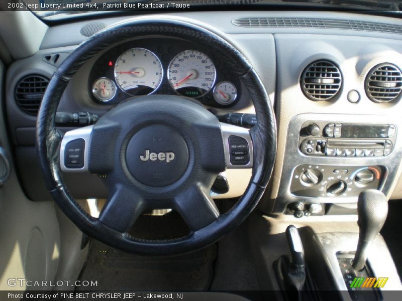 Patriot Blue Pearlcoat / Taupe 2002 Jeep Liberty Limited 4x4