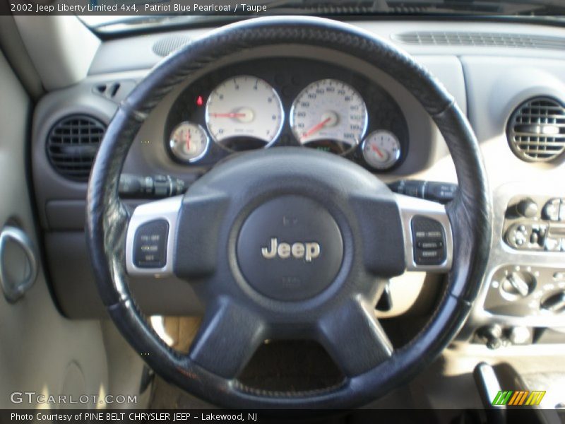 Patriot Blue Pearlcoat / Taupe 2002 Jeep Liberty Limited 4x4