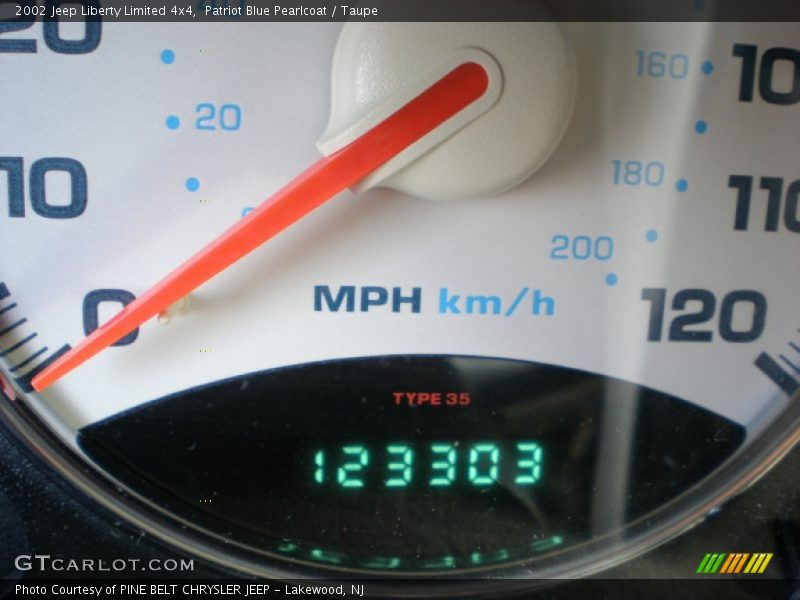 Patriot Blue Pearlcoat / Taupe 2002 Jeep Liberty Limited 4x4