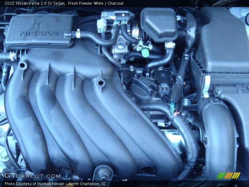 Fresh Powder White / Charcoal 2012 Nissan Versa 1.6 SV Sedan