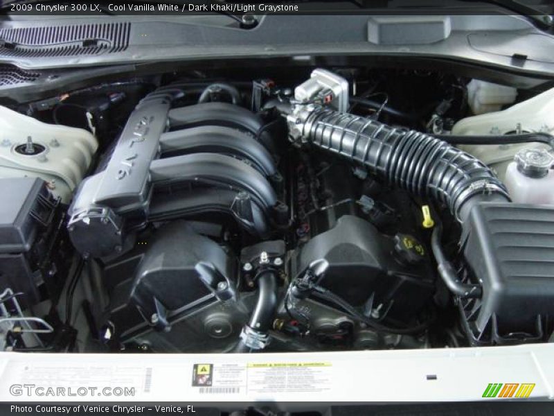 Cool Vanilla White / Dark Khaki/Light Graystone 2009 Chrysler 300 LX
