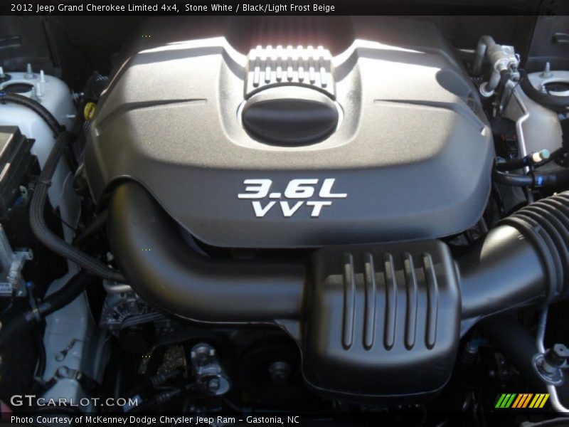 Stone White / Black/Light Frost Beige 2012 Jeep Grand Cherokee Limited 4x4