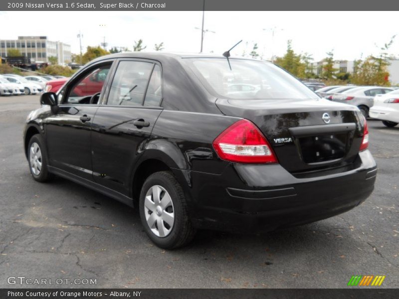 Super Black / Charcoal 2009 Nissan Versa 1.6 Sedan