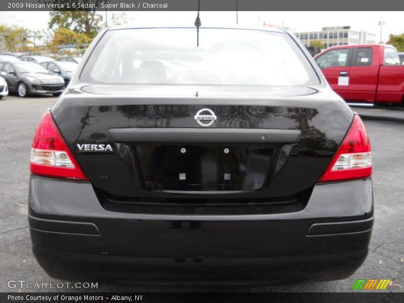 Super Black / Charcoal 2009 Nissan Versa 1.6 Sedan