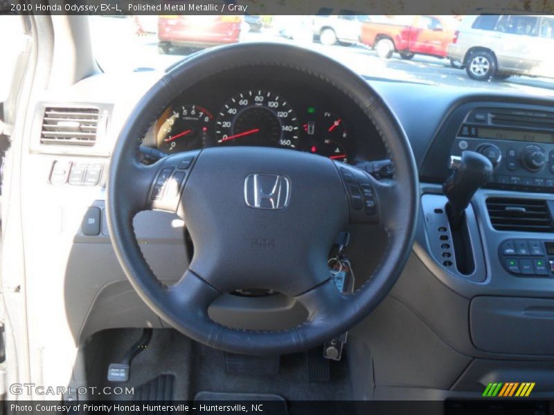 Polished Metal Metallic / Gray 2010 Honda Odyssey EX-L