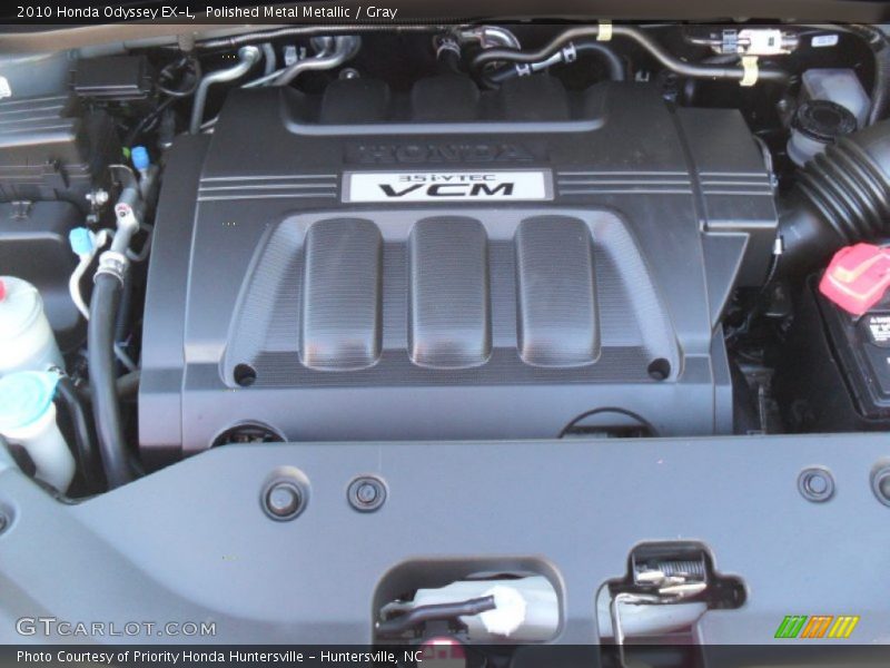 Polished Metal Metallic / Gray 2010 Honda Odyssey EX-L