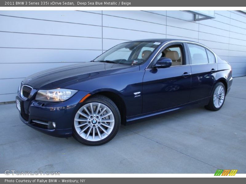 Front 3/4 View of 2011 3 Series 335i xDrive Sedan