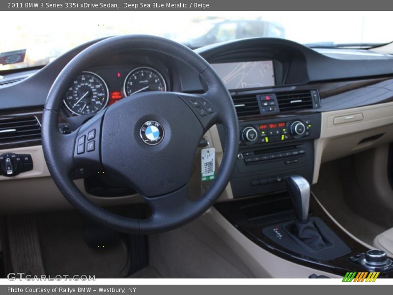 Deep Sea Blue Metallic / Beige 2011 BMW 3 Series 335i xDrive Sedan