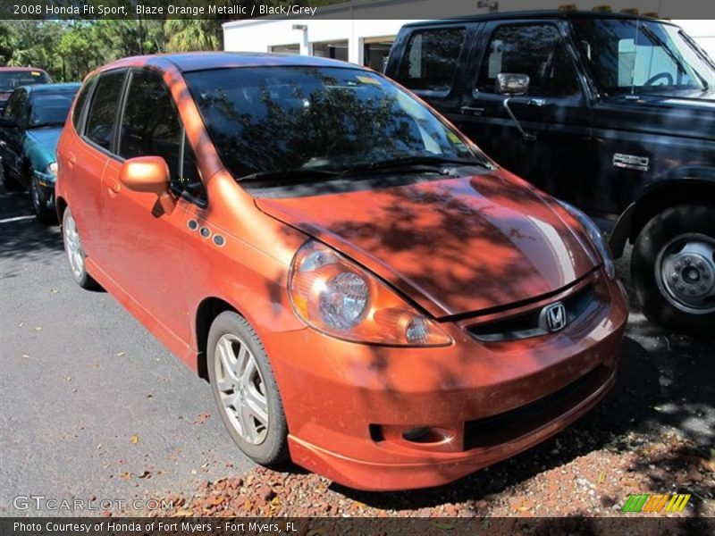 Blaze Orange Metallic / Black/Grey 2008 Honda Fit Sport