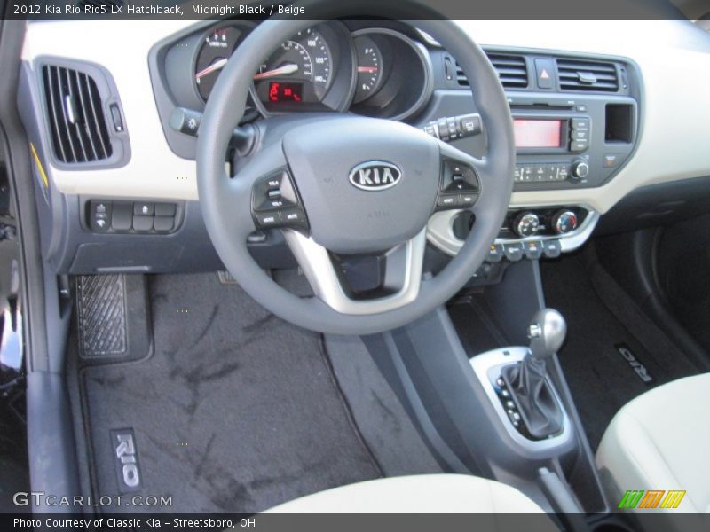Dashboard of 2012 Rio Rio5 LX Hatchback