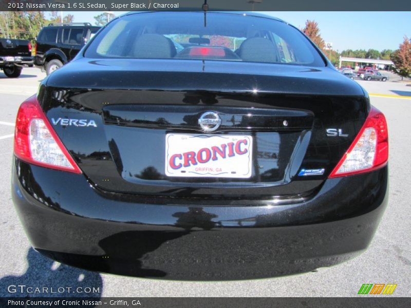 Super Black / Charcoal 2012 Nissan Versa 1.6 SL Sedan