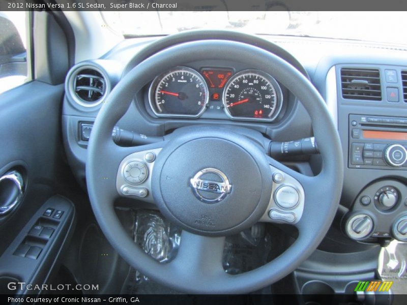 Super Black / Charcoal 2012 Nissan Versa 1.6 SL Sedan