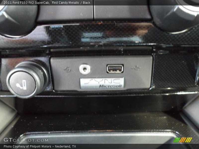 Red Candy Metallic / Black 2011 Ford F150 FX2 SuperCab