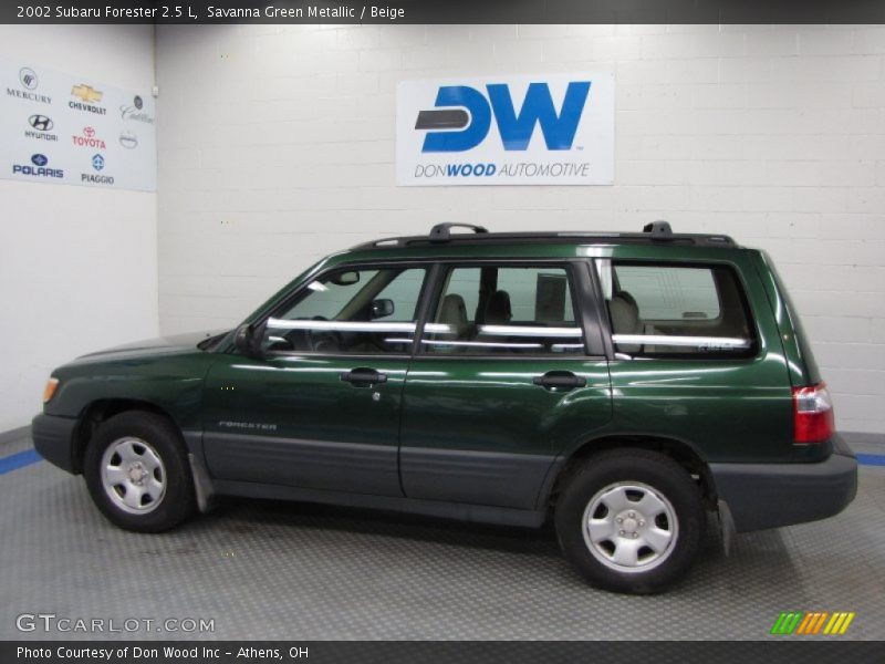 Savanna Green Metallic / Beige 2002 Subaru Forester 2.5 L