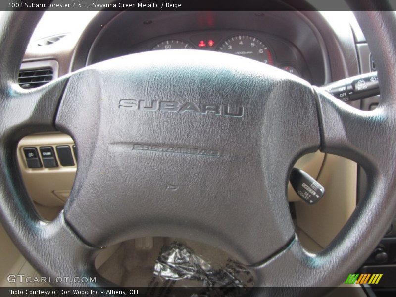 Savanna Green Metallic / Beige 2002 Subaru Forester 2.5 L