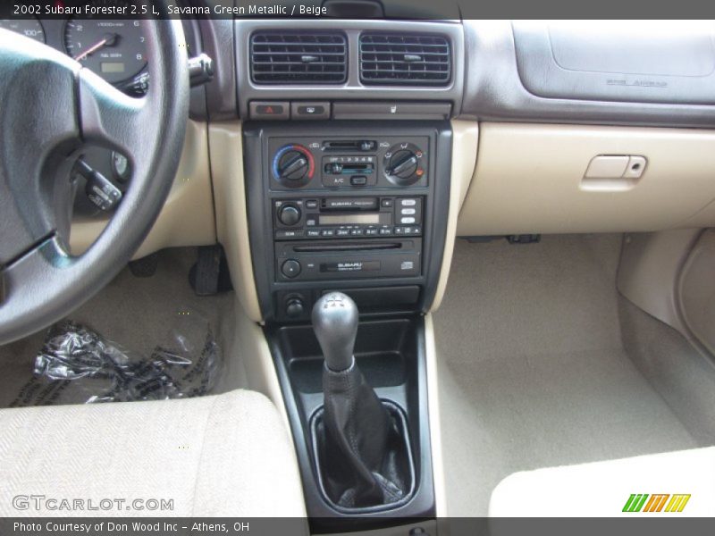 Savanna Green Metallic / Beige 2002 Subaru Forester 2.5 L