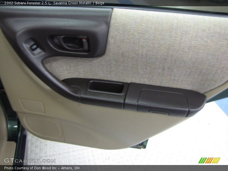 Savanna Green Metallic / Beige 2002 Subaru Forester 2.5 L