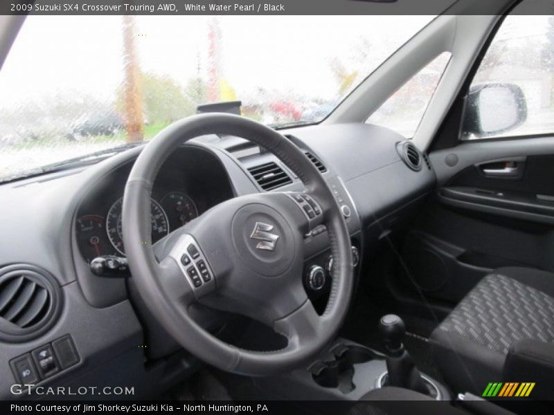 White Water Pearl / Black 2009 Suzuki SX4 Crossover Touring AWD