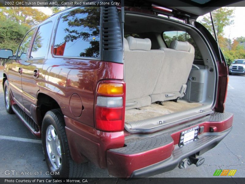 Garnet Red Metallic / Stone Gray 2002 GMC Yukon Denali AWD